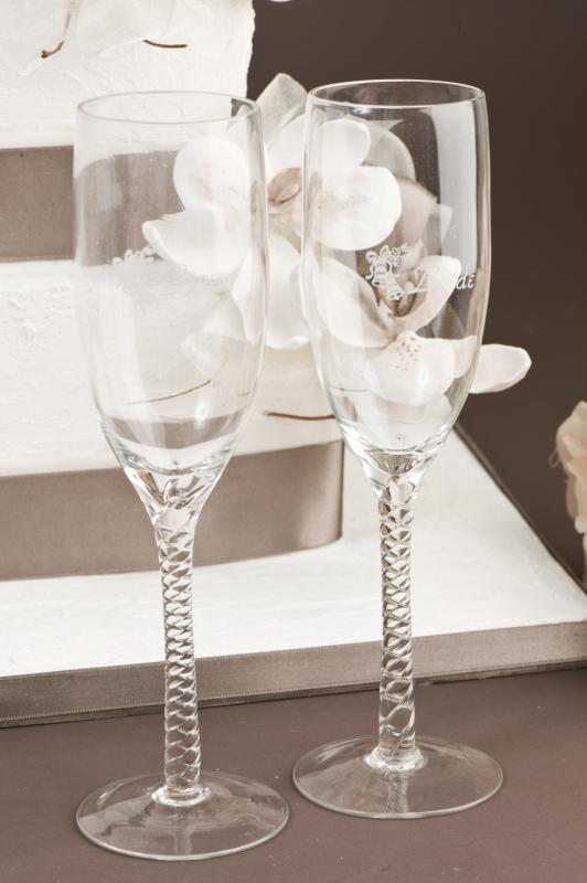 These wedding toasting glasses are etched with Bride and Groom and finished 